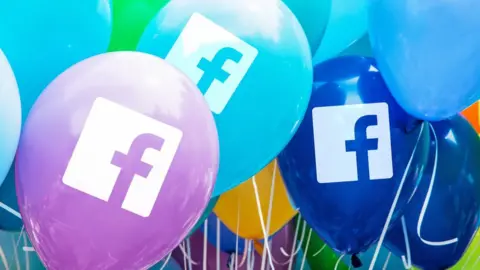 Getty Images Facebook logo on balloons