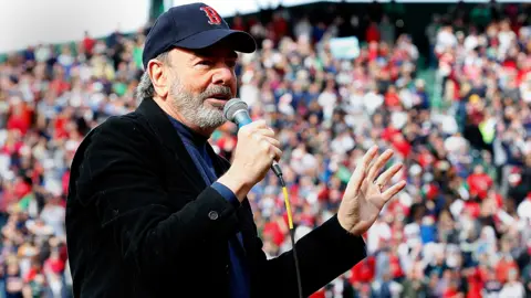 Getty Images Diamond performed the song at Boston Red Sox's Fenway Park in 2013