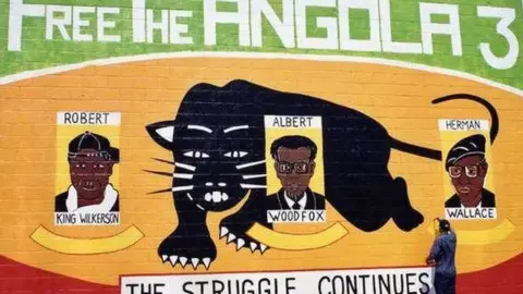 Angola3.org Mural by Rigo 23