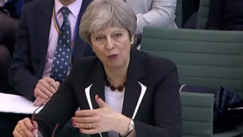 AFP Theresa May speaking to MPs