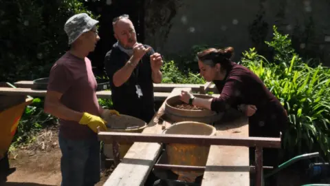 Archaeologist Martin Stables (left) with Dr Patrick Ranolph-Quinney and PhD student Keziah Warburton