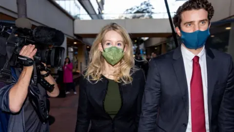 Getty Images Elizabeth Holmes and her partner Billy Evans