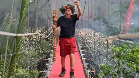 James Gourley/ITV/Shutterstock Harry Redknapp after being crowned king of the jungle in December 2018