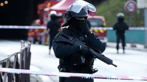 EPA French police guard security perimeter at the Hautes-Bruyères public park in Villejuif, near Paris, 3 January 2020