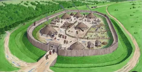 A cartoon style image of round thatched buildings in an enclosure of wooden fences. Green land surrounds it.