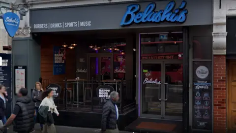 Google An image shows pedestrians walking past a bar with Belushi's branding on it in Borough High Street