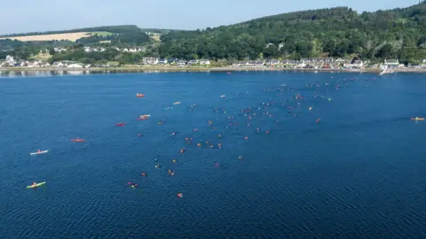 Paul Campbell An aerial drone image showing the water of the Kessock Channel and swimmers