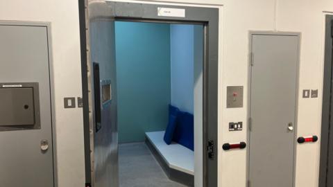 Cell door open in custody suite