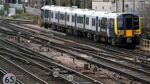 Andrew Matthews/PA Media A South Western Railway train in a siding