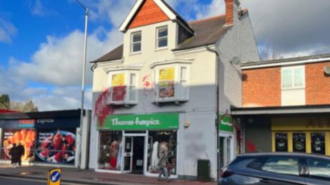 Thames Hospice charity shop vandalised with red paint