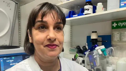 A doctor in a white lab coat