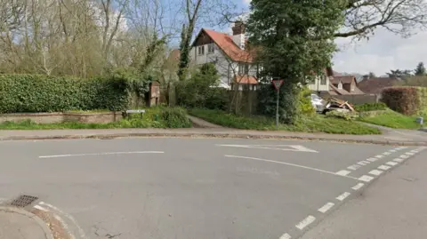 Google street view of the junction of two roads. 