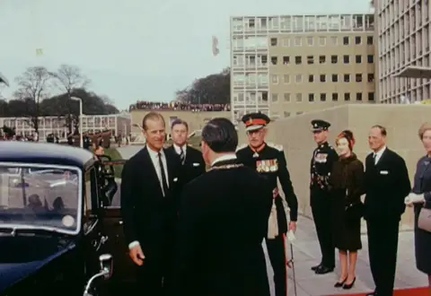 The North East Film Archive A group of dignitaries greet Prince Philip outside of the new County Hall
