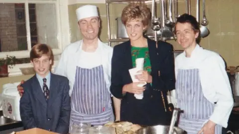 THE PASSAGE Prince William aged 11 with his mother Diana, helping in the kitchen of the Passage charity for the homeless