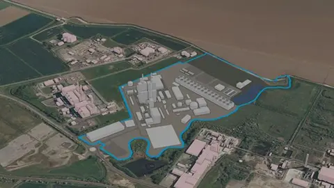 An aerial artist impression of the power station it shows a series of grey buildings next to the Humber Estuary with green fields around it 