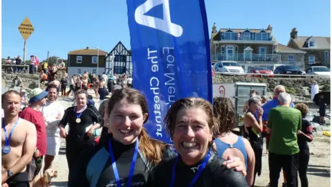 Smart family A photo of two swimmers