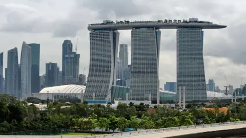 ROSLAN RAHMAN Marina Bay Sands hotel and Singapore skyline