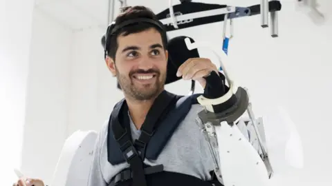 Fonds de dotation Clinatec Thibault in the exoskeleton