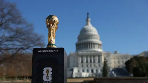 The World Cup trophy in front of the White House