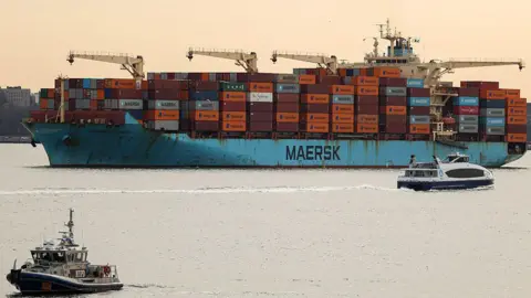 Getty Images A Maersk cargo ship loaded with shipping containers 