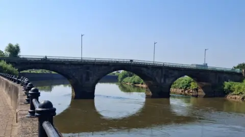 Local Democracy Reporting Service A large bridge over the River Trent. The sky is blue.