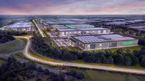 WMCA A CGI image of Greenpower Park, a largescale site with flat-roofed factory buildings surrounded by carparking, roads and greenery.