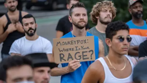 Getty Images Protesters in New York City demand more action to combat the spread of monkeypox