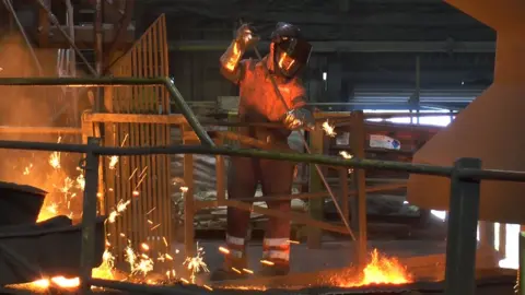 Saint-Gobain PAM UK Worker at Holwell factory in Melton Mowbray