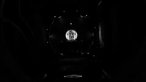 Jay Tate looking through the Drax telescope