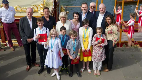 PA Jim Broadbent, Jason Isaacs, Amanda Abbingdon, David Walliams, Chris Evans, Dara O'Briain and Shobna Gulati with the Duchess of Cornwall (centre) and the winning writers