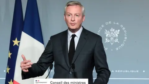Getty Images French Finance Minister Bruno Le Maire giving a speech