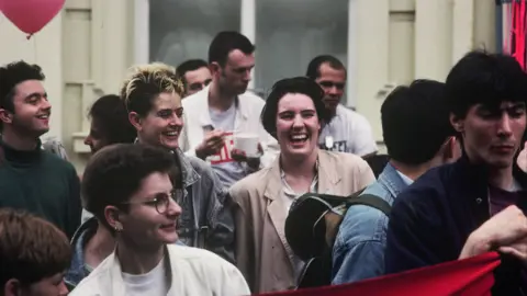 Abigail Dombey A group of people at a protest in 1991.