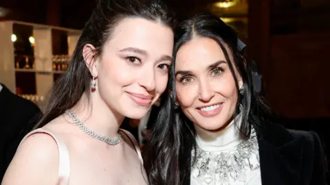 Mikey Madison and Demi Moore