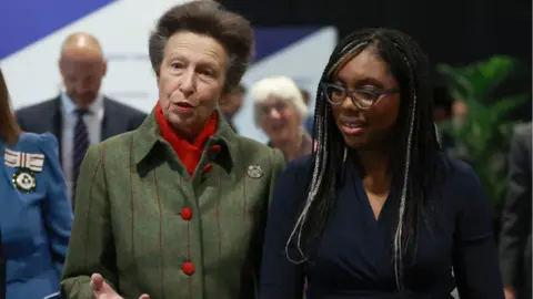 PA Media The Princess Royal and Secretary of State for Business and Trade, Kemi Badenoch at the summit