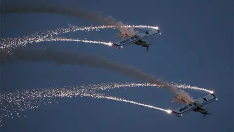 Owen Humphreys/PA Wire The Fireflies aerobatic display team perform last night at the Sunderland International Airshow