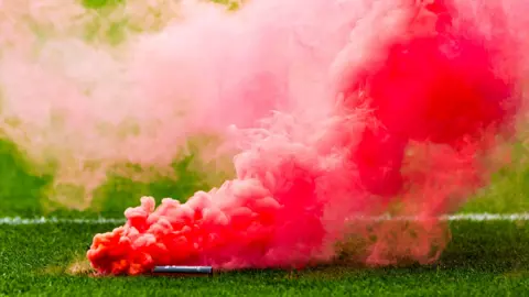 Flare on the pitch at Hampden Park