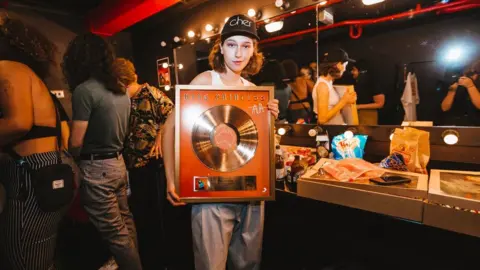 Jess Gleeson King Princess with her gold disc