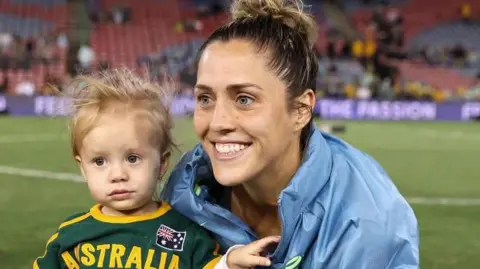 Katrina Gorry and her daughter Harper during the Women's World Cup 2023