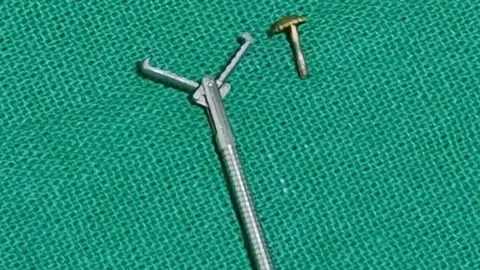 BBC The forceps and the nose pin