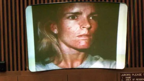 AFP A picture of a beaten Nicole Brown Simpson taken on 01 January 1989 is displayed in court