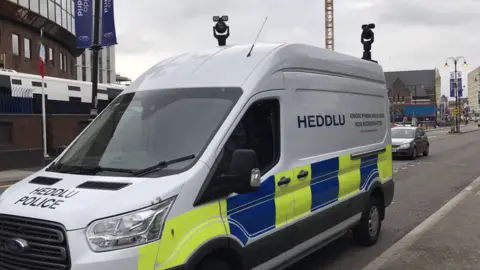 BBC Police automatic face recognition unit in operation around Cardiff city centre