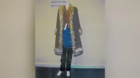 Locate Interational Clothing woman was wearing