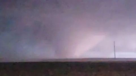 Stephanie Cox / @Stormwatcher771 Tornado seen near town of Rolling Fork