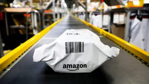 Getty Images A product sits on a conveyer belt in an Amazon warehouse