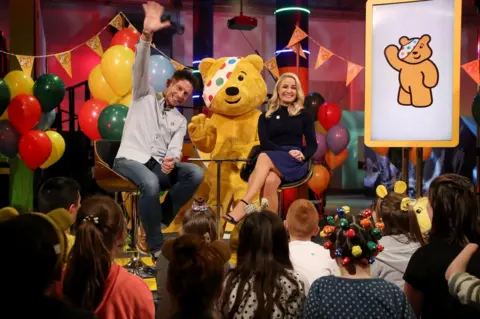 William Cherry Stephen Clements, Holly Hamilton and Pudsey present the Children in Need show in Belfast