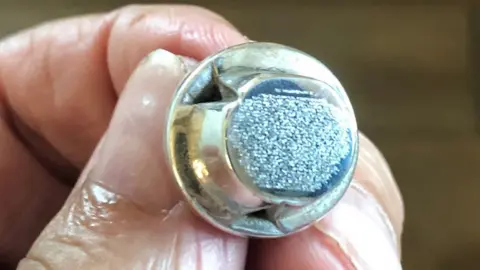 Graham Short Graham Short holding his tribute to the Hillsborough disaster victims