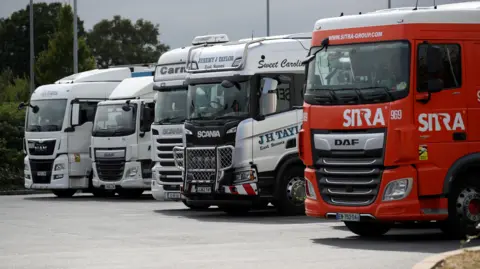 Reuters Lorries parked at service station