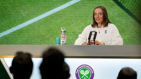 Iga Swiatek speaks to the media at Wimbledon in 2025