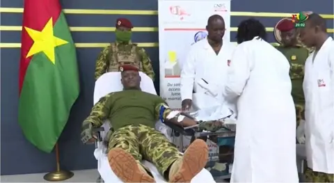 RTB Capt Traoré lies down while giving blood