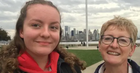 Naomi Barlow Naomi Barlow said her mum Rachel, Naomi wears red hoodie